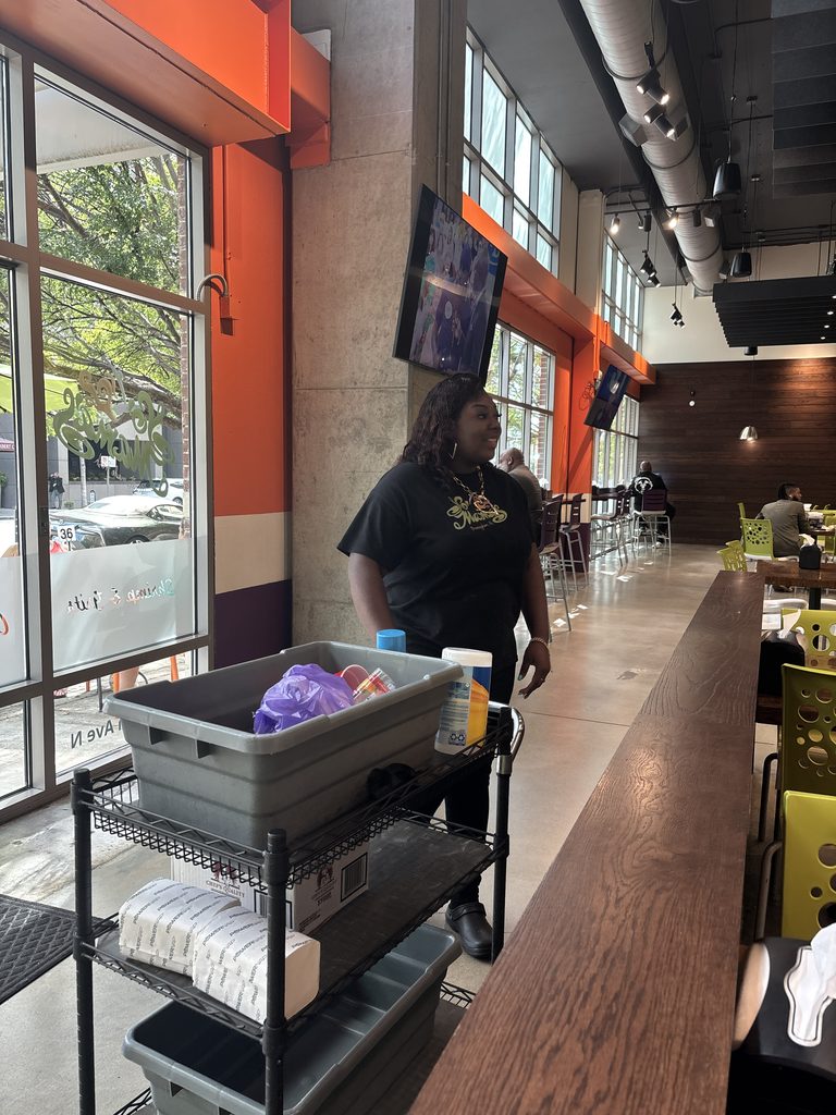 Jamyia interacting with staff